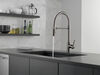 Llave para cocina extensible de una manija con tubo de salida con muelle