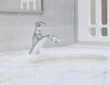 Llave para baño de un orificio con cartucho medidor de cierre lento