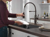 Llave para cocina extensible de una manija con tubo de salida con muelle
