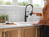 Llave para cocina extensible de una manija con tubo de salida con muelle