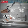 Llave para cocina tipo puente extensible con dos manijas