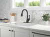 Llave para cocina extensible de una manija con tecnología ShieldSpray®