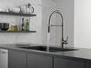 Llave para cocina extensible de una manija con tubo de salida con muelle