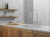 Llave para cocina tipo puente extensible con dos manijas