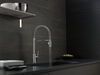 Llave para cocina extensible de una manija con tubo de salida con muelle