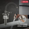 Llave para cocina extensible de una manija con tubo de salida con muelle