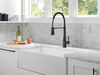 Llave para cocina extensible de una manija con tubo de salida con muelle