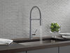 Llave para cocina extensible de una manija con tubo de salida con muelle