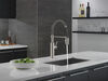 Llave para cocina extensible de una manija con tubo de salida con muelle