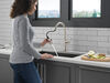 Llave de una manija con tubo de salida deslizable para cocina