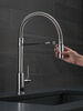 Llave para cocina extensible de una manija con tubo de salida con muelle