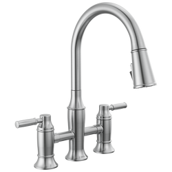 Llave para cocina tipo puente extensible con dos manijas