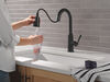 Llave de una manija con tubo de salida deslizable para cocina