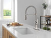 Llave monomando deslizable para cocina con salida con resorte