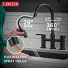 Llave para cocina tipo puente extensible con dos manijas