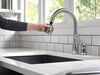 Llave de una manija con tubo de salida deslizable para cocina