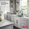 Lavabo de cocina tipo estación de trabajo con un receptáculo de compuesto de granito de 30" de montaje bajo encimera, con reborde WorkFlow™ y accesorios en negro metálico