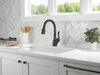 Llave para cocina extensible de una manija con tecnología ShieldSpray®