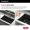 Lavabo de cocina tipo estación de trabajo con un receptáculo de compuesto de granito de 30" de montaje bajo encimera, con reborde WorkFlow™ y accesorios en negro metálico