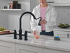 Llave para cocina tipo puente extensible con dos manijas