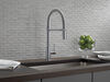 Llave para cocina extensible de una manija con tubo de salida con muelle