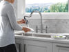 Llave para cocina tipo puente extensible con dos manijas