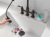 Llave para cocina tipo puente extensible con dos manijas