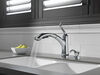 Llave extensible para cocina de una manija con dispensador de jabón