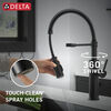 Llave para cocina extensible de una manija con tubo de salida con muelle