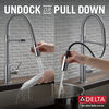 Llave para cocina extensible de una manija con tubo de salida con muelle