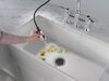 Llave para cocina tipo puente extensible con dos manijas