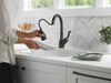 Llave para cocina extensible de una manija con tecnología ShieldSpray®