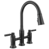 Llave para cocina tipo puente extensible con dos manijas