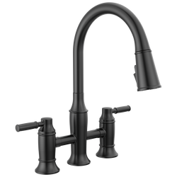 Llave para cocina tipo puente extensible con dos manijas